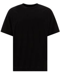Givenchy - T-Shirt With Embossed Logo - Lyst