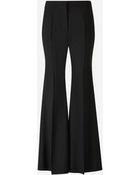 Givenchy - Crepe Flare Trousers - Lyst