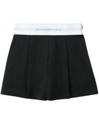 Alexander Wang - Logo-waistband Pleated Shorts - Lyst