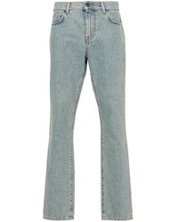 Moschino - Straight Jeans With A Faded Effect - Lyst