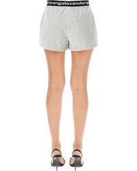 Femme Vêtements Shorts Mini shorts Short marine à logo thermocollé Coton T By Alexander Wang en coloris Noir 