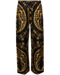 Marine Serre - Black Loose Pants With All-over Graphic Print In Silk Man - Lyst