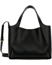 Stella McCartney - Black Tote Bag With Perforated Logo Lettering Detail At The Front In Faux Leather Woman - Lyst