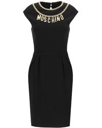 Moschino Short Dress With Logo Lettering And Charm - Black