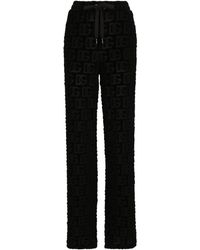 Slacks and Chinos Skinny trousers Womens Clothing Trousers Dolce & Gabbana Synthetic Lace-up High-rise Slim Pants in Black 