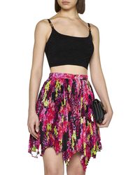 Versace - Asymmetric Pleated Mini-Skirt With Logo Orchid Print - Lyst