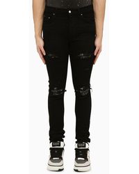Amiri - Skinny Jeans With Camouflage Patches - Lyst