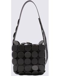 White Issey Miyake Maize Cut-out Faux-leather Shoulder Bag in Black Womens Bags Crossbody bags and purses 