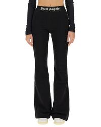 Palm Angels - Logo Tape Flare Trousers - Lyst