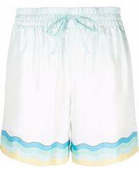 Femme Vêtements Shorts Shorts fluides/cargo Short à imprimé Le Jeu de Ping Pong Soie CASABLANCA en coloris Blanc 