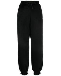 MSGM - Logo-embroidered Tapered-leg Trousers - Lyst