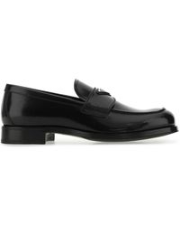 Prada - Logo Plaque Leather Loafers - Lyst
