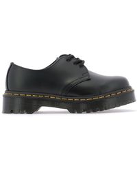 dr martens 1490 10 eye bex boots in black