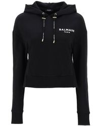 Balmain - Cropped Sweatshirt With Flocked Logo Print - Lyst