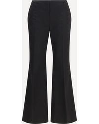TOTEME - Kick Flare Raw-Edge Pants - Lyst