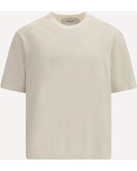 Golden Goose - T-Shirt With An Embossed Reverse Golden Logo - Lyst