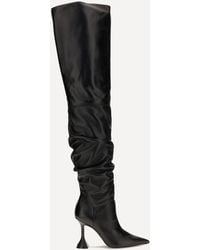 AMINA MUADDI - Olivia Thigh-High Boots - Lyst