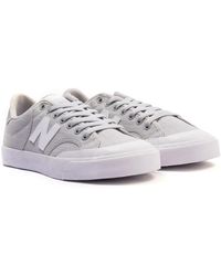 new balance 480 court trainers in white and green