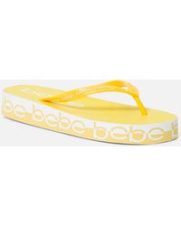 yellow platform flip flops