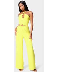 Bebe Synthetic Tie Front Halter Jumpsuit in Black Womens Clothing Jumpsuits and rompers Full-length jumpsuits and rompers 