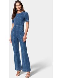 Blue Womens Clothing Jumpsuits and rompers Full-length jumpsuits and rompers Bebe Wide Leg Multi Button Denim Jumpsuit in Dark Indigo Wash 