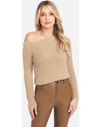 white distressed sweater