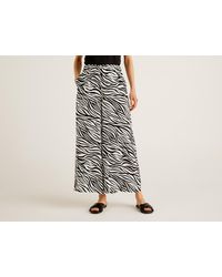 Pantaloni casual, eleganti e chino da donna di Benetton a partire da 20 €