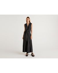 Pagliaccetti e tute intere da donna di Benetton a partire da 40 €