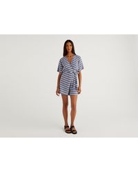 Pagliaccetti e tute intere da donna di Benetton a partire da 40 €