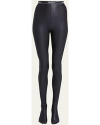 Saint Laurent - Shiny Footed Leggings With Logo Band - Lyst