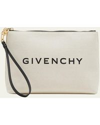 Givenchy - Large Pouch Wristlet In Canvas - Lyst