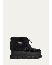 Prada - 40Mm Triangle Logo Shearling Lace-Up Snow Boots - Lyst