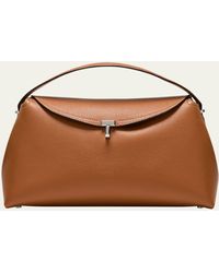 Totême - T-lock Top Handle Bag In Pebble Grain Leather - Lyst