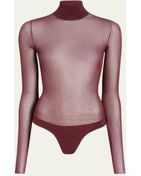 KHAITE - Tallin Sheer Mesh Turtleneck Bodysuit - Lyst