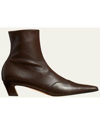 KHAITE - Nevada Stretch Leather Ankle Booties - Lyst