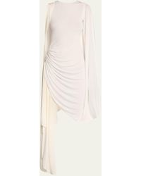 Alaïa - Ruched Draped Jersey Mini Cape Dress - Lyst