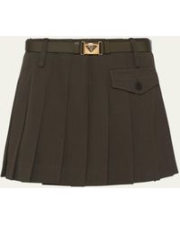 Prada - Pleated Gabardine Leather Belted Mini Skirt - Lyst