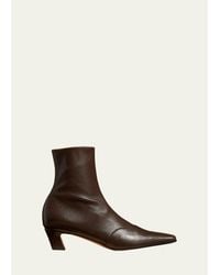 KHAITE - Nevada Stretch Leather Ankle Booties - Lyst