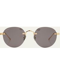 Cartier - Round Rimless Metal Sunglasses - Lyst