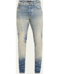 Amiri - Faded Jeans With Logo Lettering - Lyst