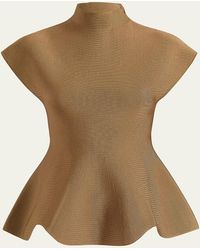 KHAITE - Andra Knit Peplum Top - Lyst