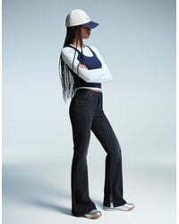 Bershka - Flared Jeans With Slit - Lyst