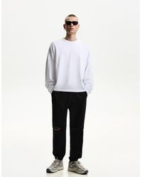 Bershka - Ripped Jogger Jeans - Lyst