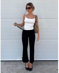 Bershka - Kick Flare Pants With Bows - Lyst