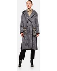 fendi coat with fur pockets