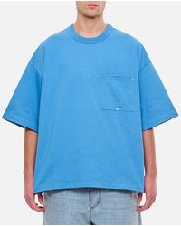 Bottega Veneta - T-shirt in cotone con collo a giro e tasca frontale - Lyst
