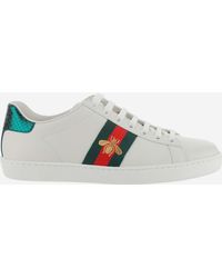 Scarpe sneakers new ace in pelle liscia con fasce web gucci e ricami lurex  ape - Stileo.it