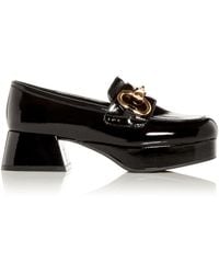 red pointed court shoes