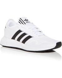 black and white low top adidas