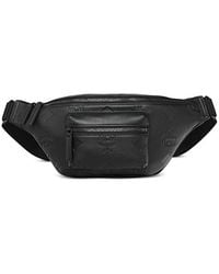 MCM - Fursten Medium Maxi Monogram Embossed Leather Belt Bag - Lyst